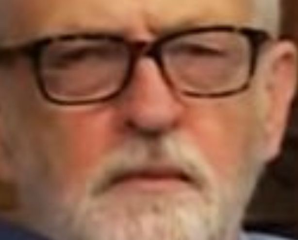 Jeremy Corbyn looking at a pathetic fascist with a mix of disgust and pity