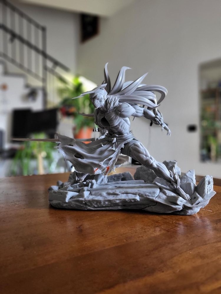 A test-print of the figure, in grey resin.