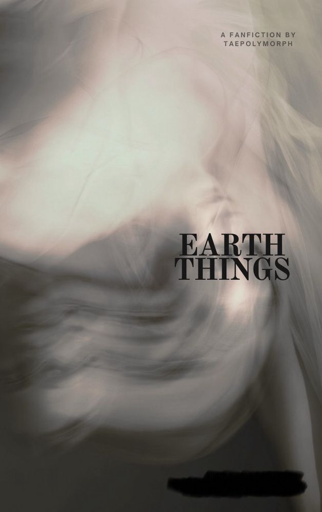 This version of poster for a fanfiction called “Earth Things” is in sepia. It shows a blurry picture of a person with long floaty hair. It seems almost like they’re levitating upside down through water or wind. The title “Earth Things” is covering the upper half of their face, so you can’t really tell what they look like.