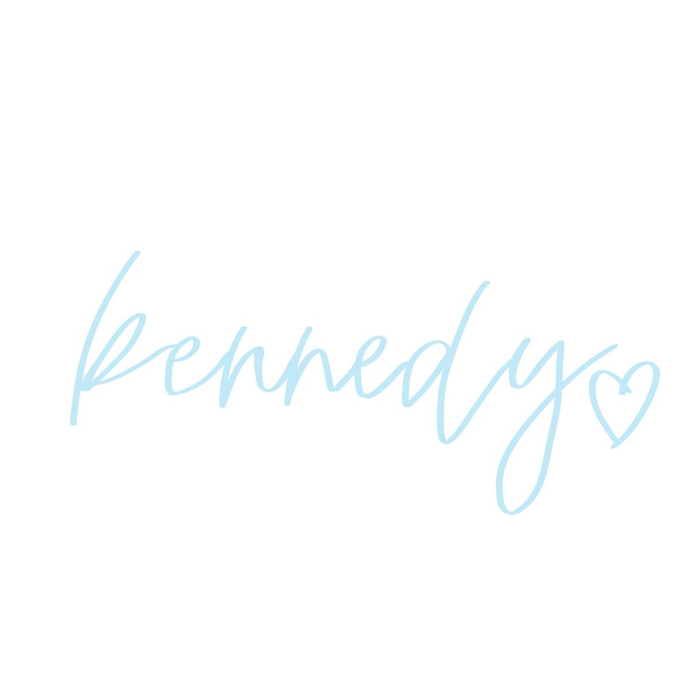 “Kennedy” with a heart written in cursive using the light blue 1989 hex color 