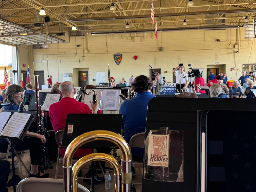 View from my music stand. Trombone in foreground, firehouse in background. 