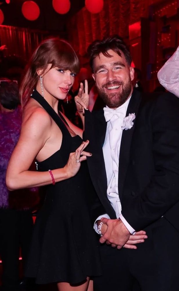 Taylor and Trav at Eras themed party.