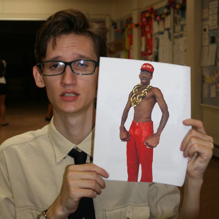 Neil Cicierega holding an image of Tyler, The Creator
