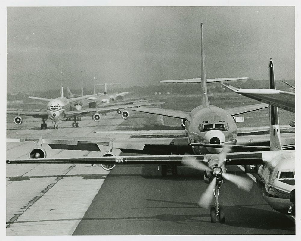 Lines of Airplanes on the Runway ready to take off