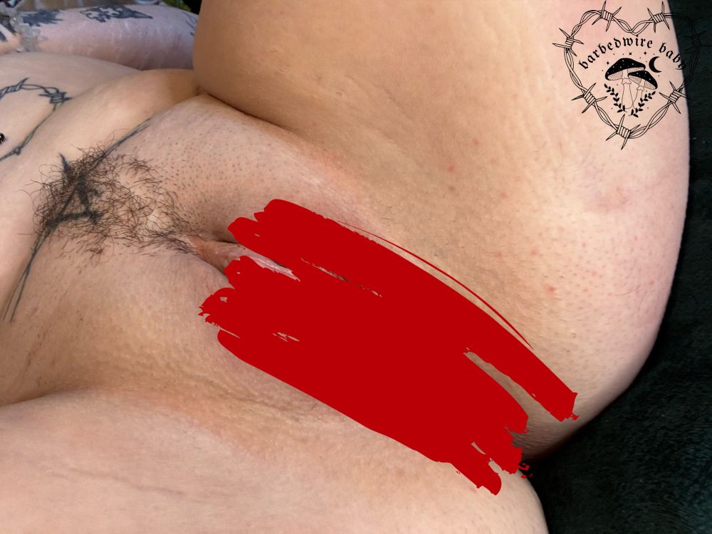 Bug’s legs are now spread and lifted, showing off their pussy fully, however it is censored. 
