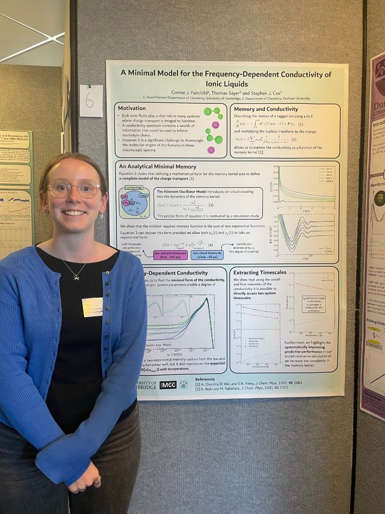 A photograph of the winner and their poster.