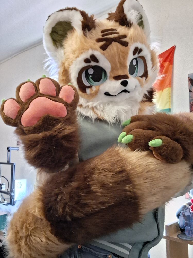 Jade snuggling his tail waving