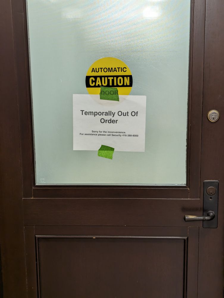 Sign reading "Temporally out of order"