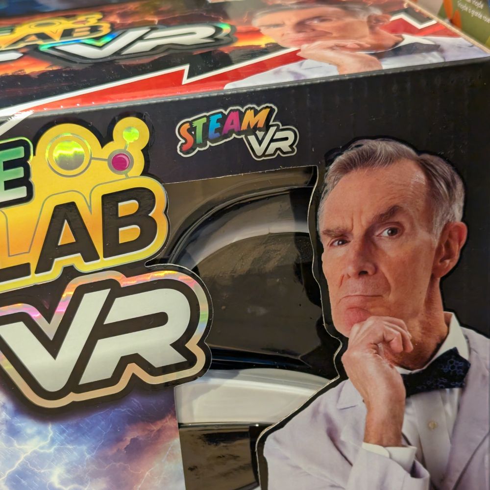 Retail box for a Bill Nye the Science Guy VR game with a label reading STEAM VR--presumably meaning "Science, Technology, Engineering, Art, Mathematics" but likely to be confused with the Valve SteamVR system