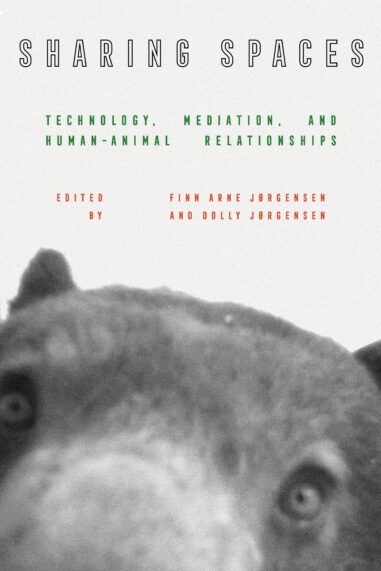 cover of book Sharing Spaces with image of the face of a bear in camera trap