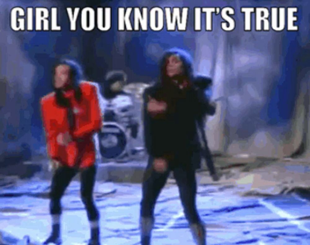 a couple of people dancing on a stage with the words girl you know it 's true above them