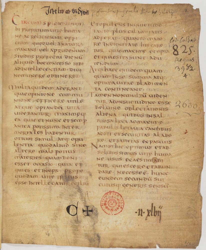 A manuscript page with writing in two columns and numerous marginal notes and scribbles, as well as a red library stamp.