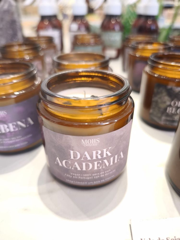A photo of a scented candle labeled “Dark Academia”
