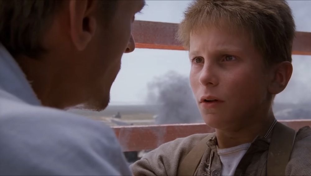 EMPIRE OF THE SUN (1987): Jim (Christian Bale) goes into shock realizing he can’t remember what his family looks like after years in a POW camp