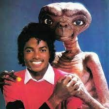 Michael Jackson (left) poses with E.T.