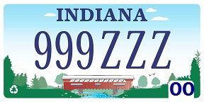Indiana license plate number 999ZZZ with dark blue text and a picture of a covered bridge spanning a stream in a woodland on a cloudy day.