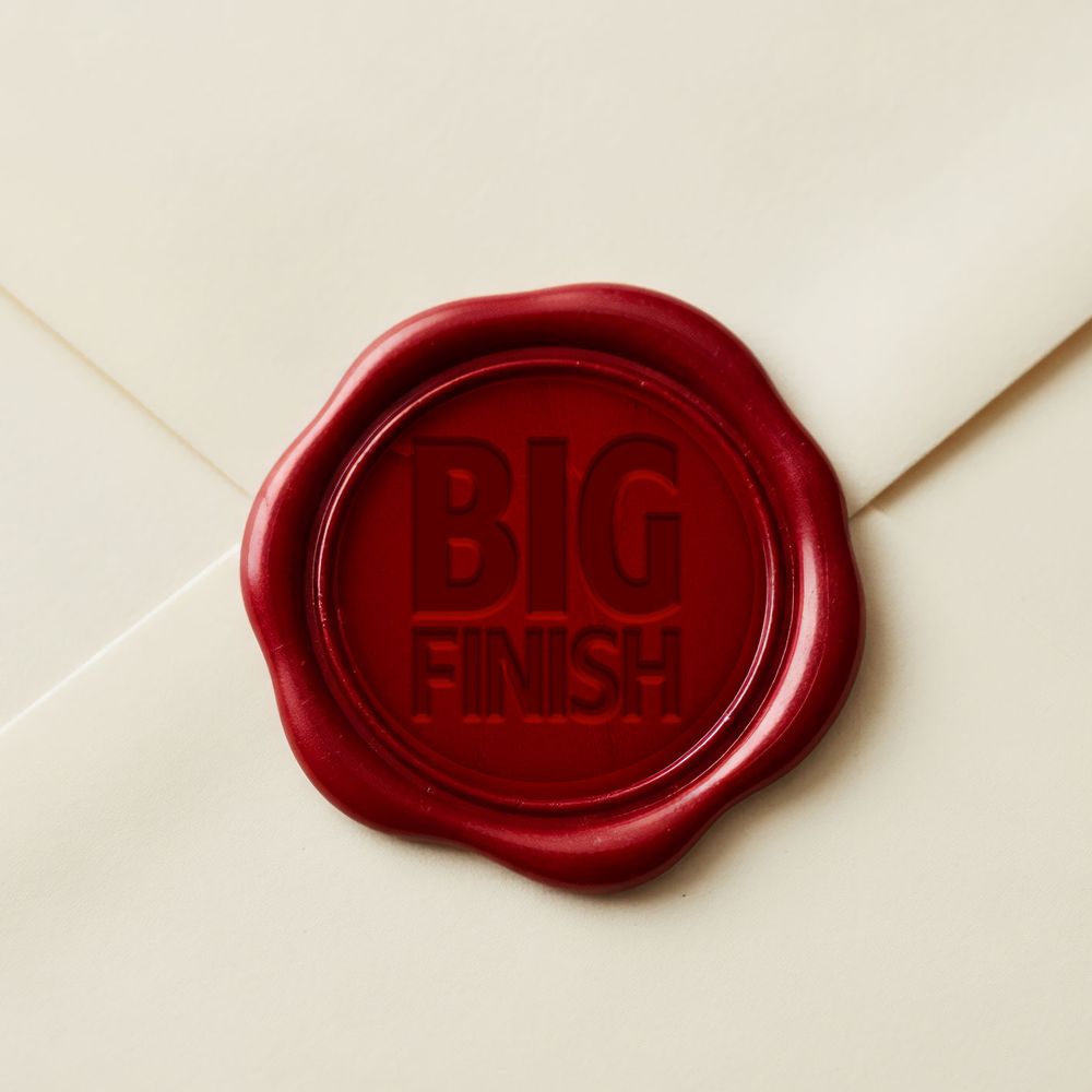 A red wax "Big Finish" seal on a white envelope. 