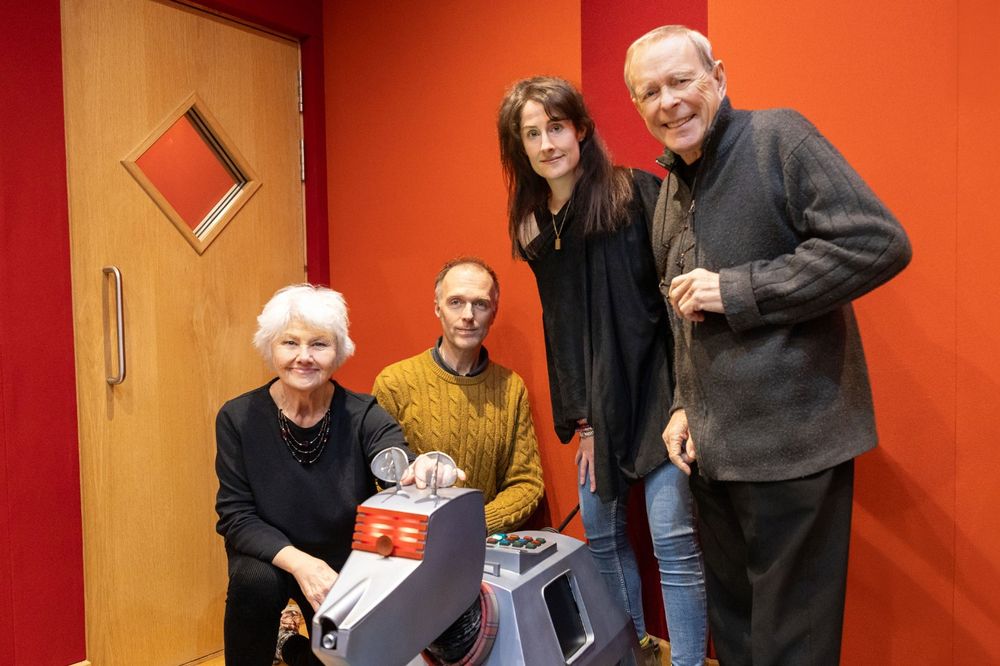 Annette Badland, Christopher Naylor, Sadie Miller and John Leeson with K9 in the Big Finish recording studio. 