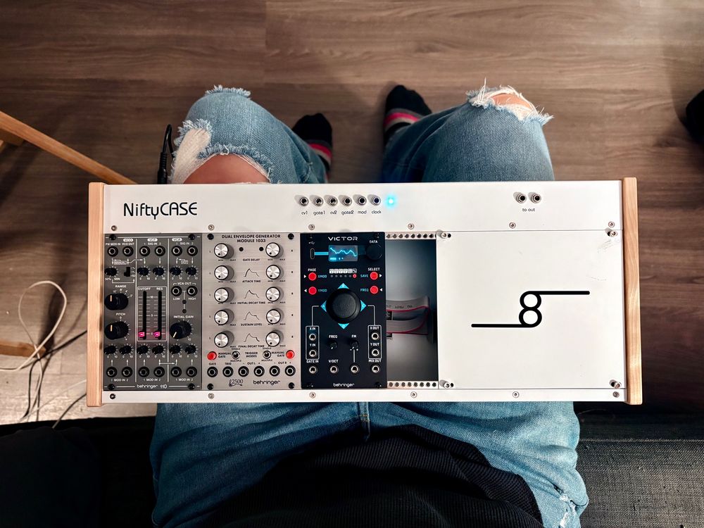 I’ve got a small modular synth case on my lap. There are only 3 modules in it so far