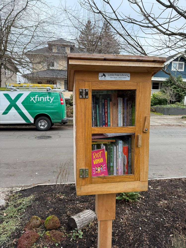 A wooden little free library