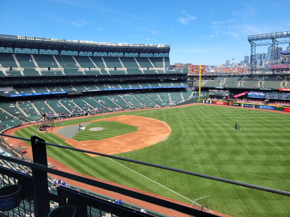 The playing field at T-Mobile Park with the Seattle skyline in the background.