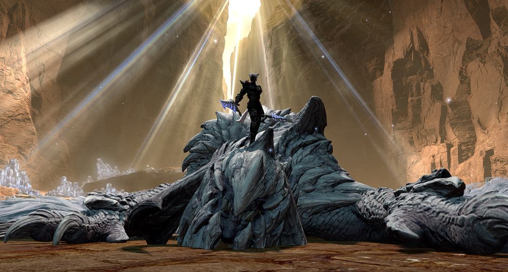 a male miqo'te dual wielding swords stands on top of a dead large wyvern