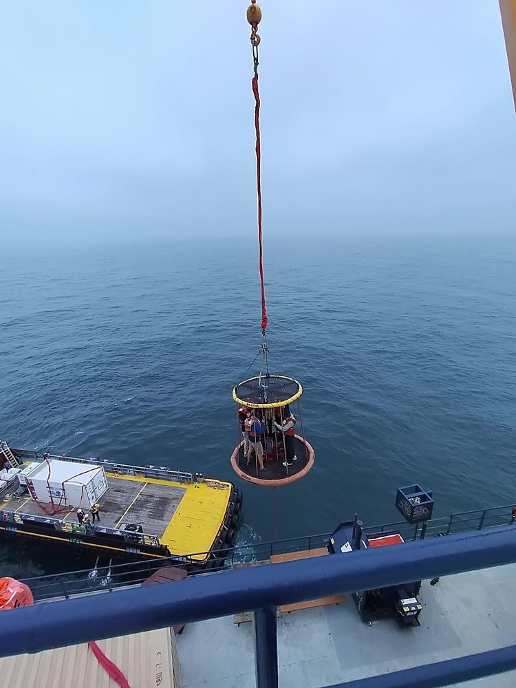 X501 team members being transferred onto the L/B Robert by Billy Pugh basket after a foggy transit. 
