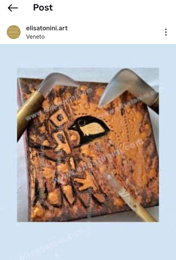 My artwok on panel called "Hello" portraying a kind of stylized great tit ( parus major) ,integrated on a copper and violet background. 
On the left, in low relief  and in venetic alphabet, it's written the name of the artwork "Ciao". On the top and on the right, there're engraved my name and surname (Elisa Tonini) and my signature with year of creation, 2025