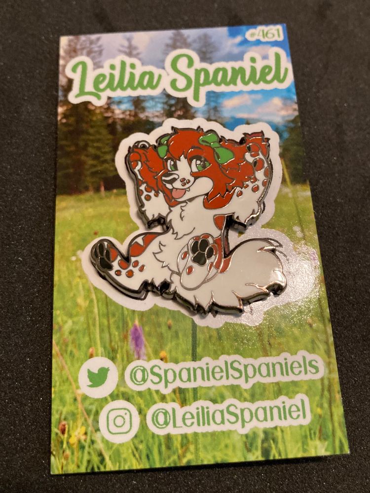 A Fursona pin featuring my character Leilia Spaniel.