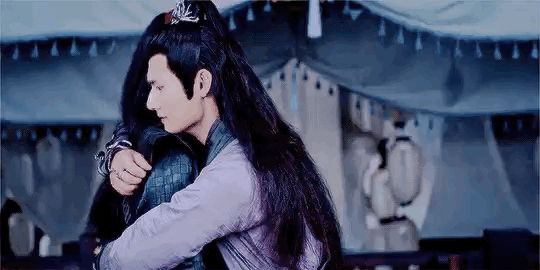 Jiang Cheng hugging Wei Wuxian 