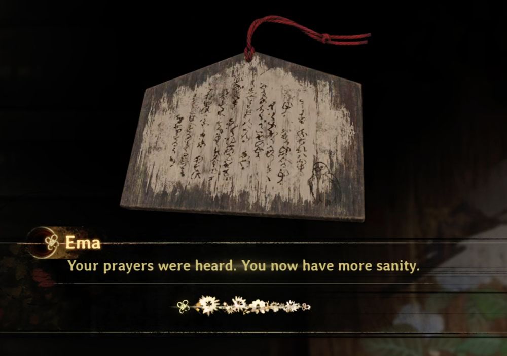 Screenshot from Silent Hill f that reads "Your prayers were heard. You now have more sanity."