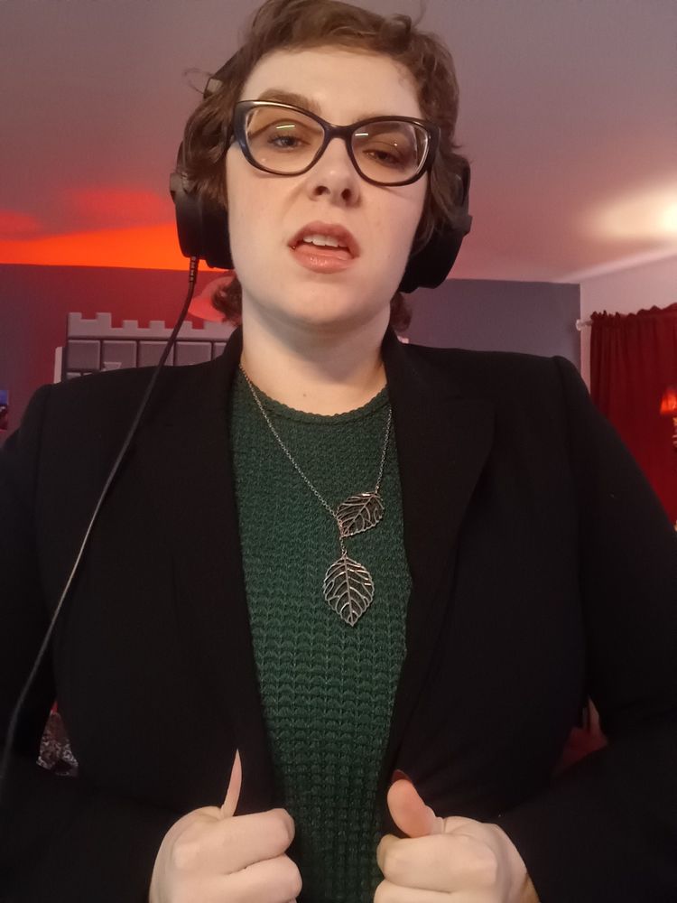 Jane in a suit and headphones