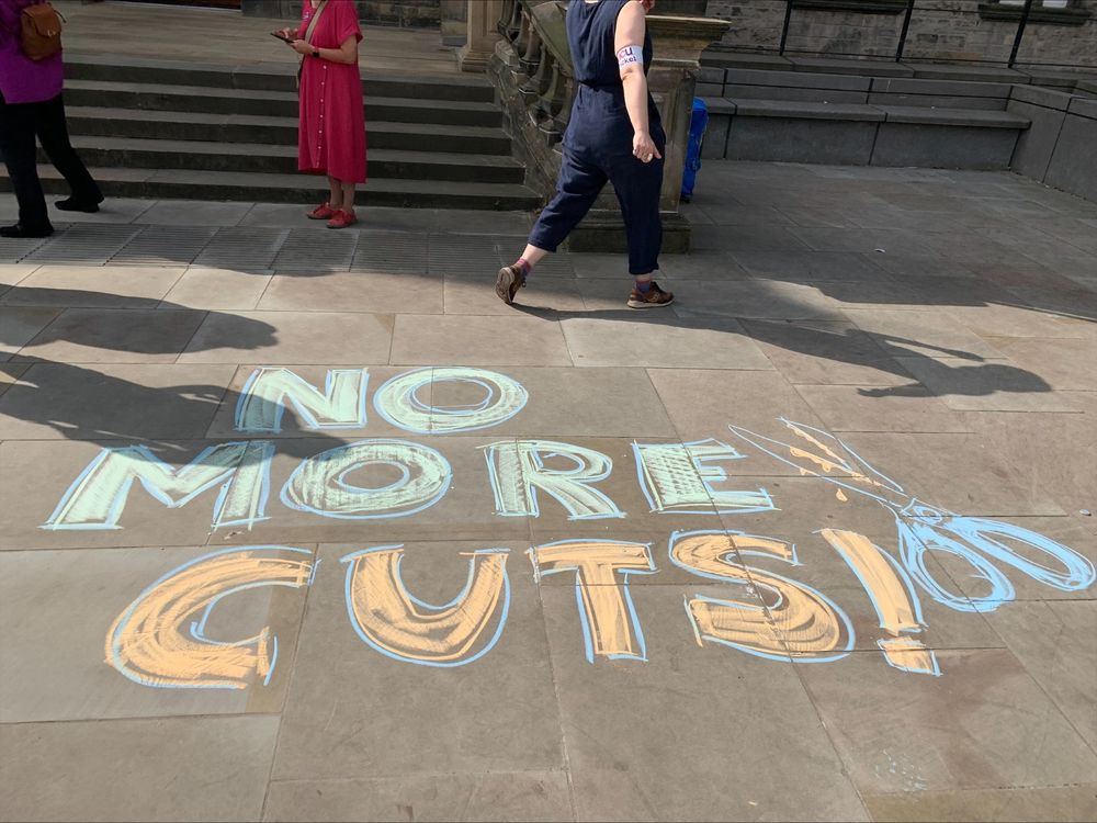 No More Cuts written in chalk