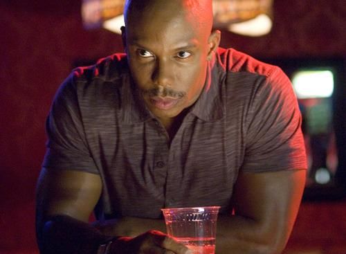 Lieutenant James Doakes (from that one show) looks up from his drink with accusing and suspicious eyes. no matter what it takes he *will* get to the bottom of whatever sick game you're playing