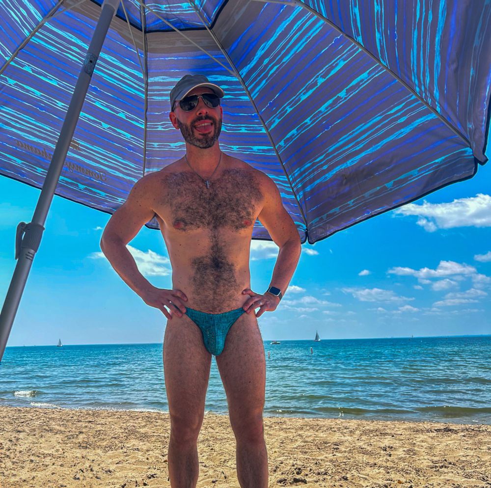 Me in a minimalist piece of swimwear at the beach
