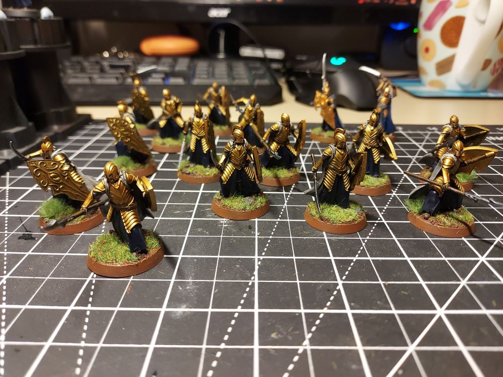 All 13 previous Elves with bright gold armour, vibrant brown base rims and glade grass.
