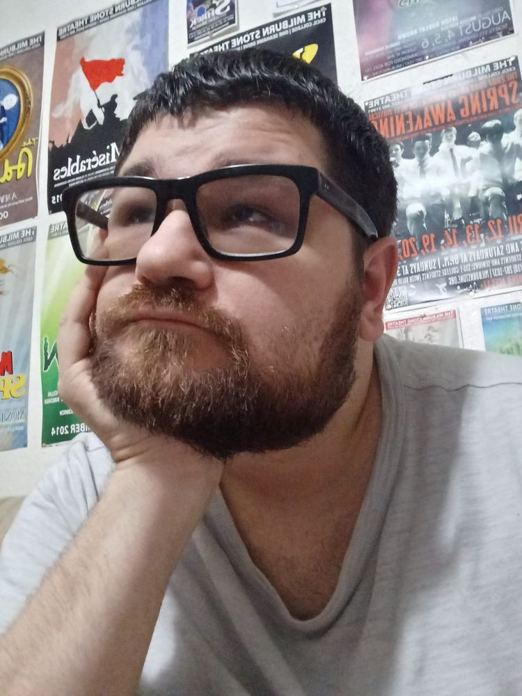 A picture of Since with a wistful look on his face