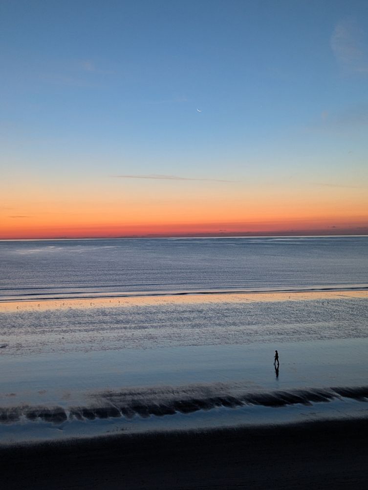 Sunrise close to low tide on the Atlantic just south of Boston. Nice almost new moon there too...