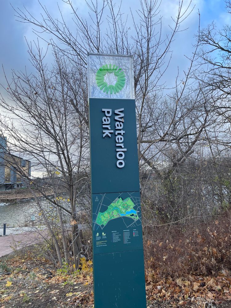 Waterloo Park way-finding marker with Silver Lake in the background.