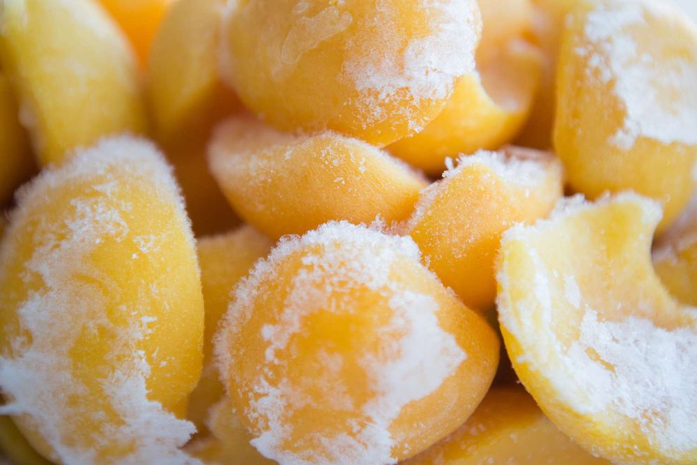 Slices of frozen peach.