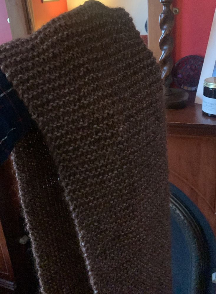 A brown knitted scarf 