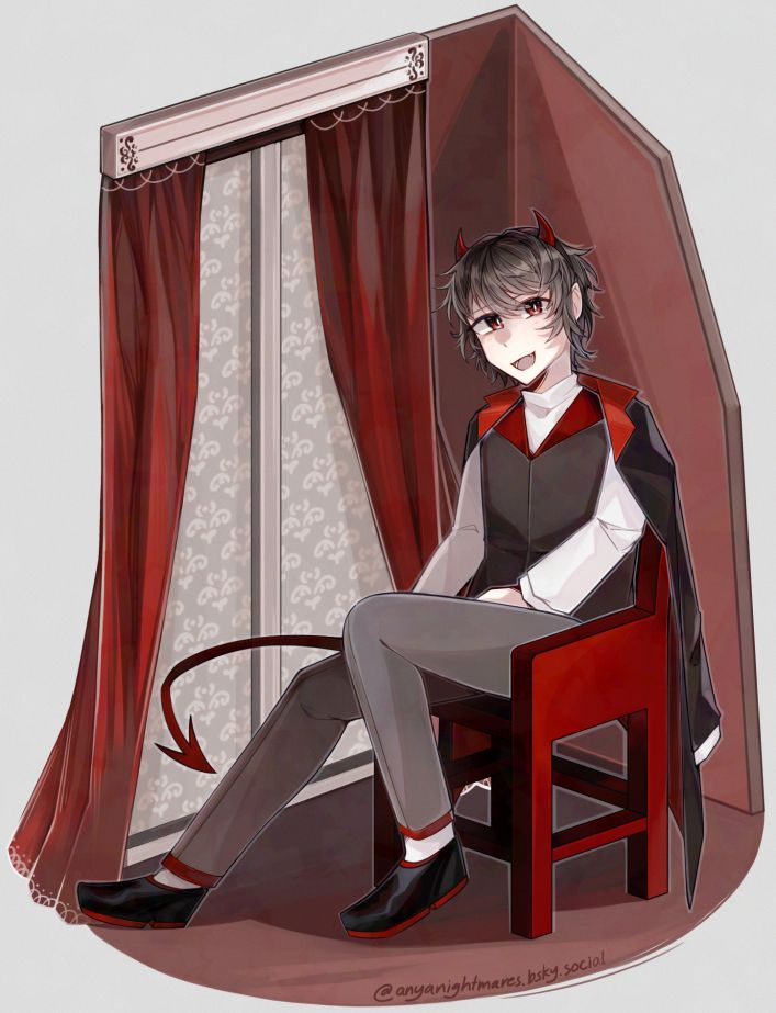 guy in chair next to large window with curtains