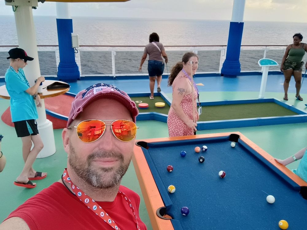 Selfie while playing pool on board a cruise ship