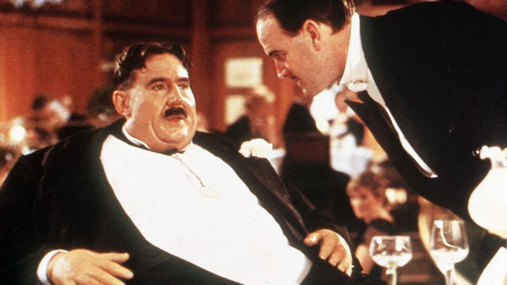 Restaurantszene aus dem Sinn des Lebens mit den beiden Darstellern.