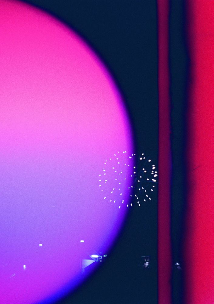 Colorful light exposures over an exploding firework. Pentax 17