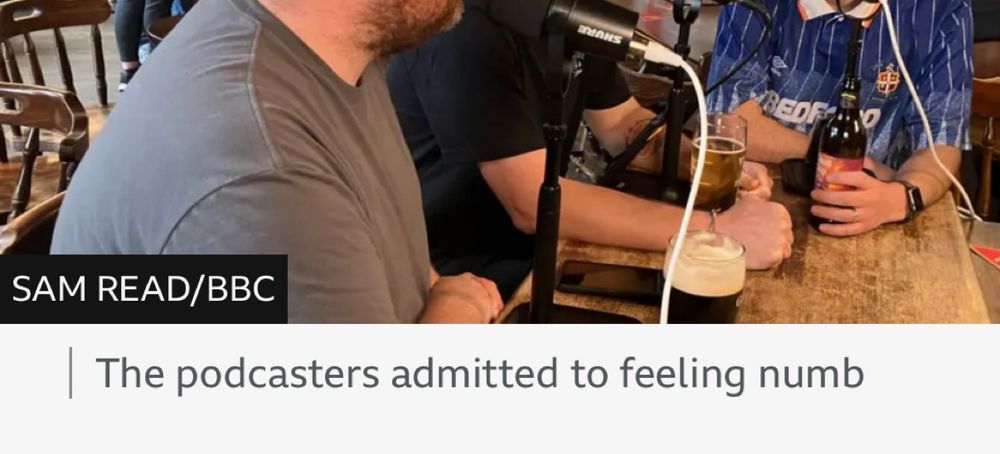 A BBC news photo caption reading “The podcasters admitted to feeling numb” 