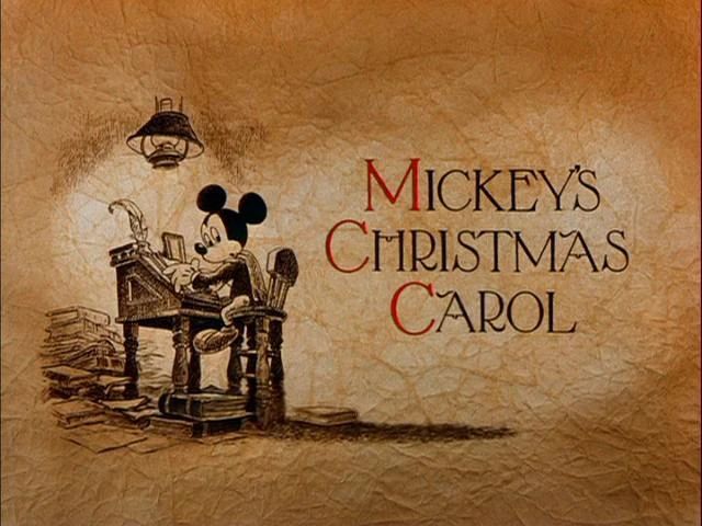 Opening title card of Mickey's Christmas Carol, with Mickey Mouse as Bob Cratchit at his desk