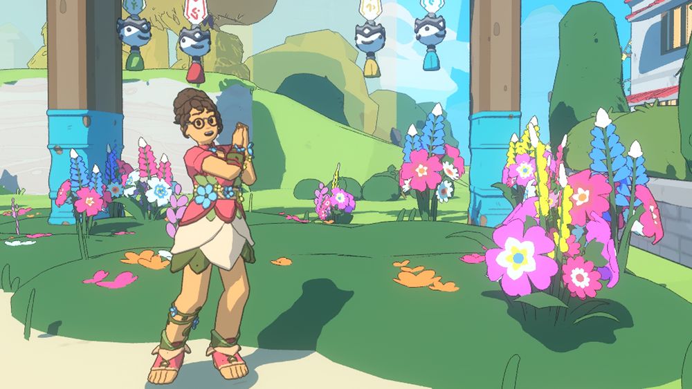 A screenshot from the game Spirit Crossing by studio Spry Fox (Netflix Games.) The screenshot takes place in an outdoor nature scene. The foreground and center focus of the screenshot is a player-character standing with their hands clapped joyously together. They're showing off a flower-themed dress and shoes as rewards from the Wildflower Season event in Spirit Crossing. Surrounding them is a variety of flower-themed decor, talismans and bunches of flowers.