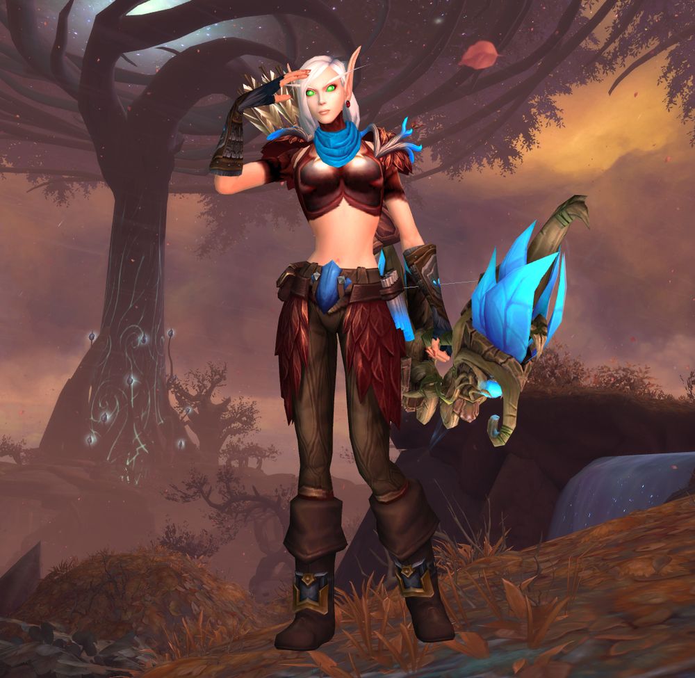 Blood elf Farstrider with pale skin and medium-length white hair wearing autumnal reddish-brown leafy armor with glowing blue accents. They have a wooden bow with blue leaves attached it it. They are standing in Ardenweald with autumnal scenery in the background.