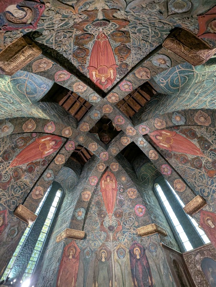 Ornate and colourful ceiling, terracotta relief, in Celtic Revival style.